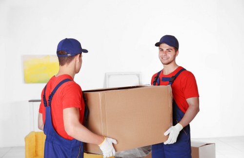Local removals team preparing a move in Richmond with boxes and furniture