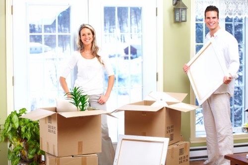 Packed office furniture and boxes ready for relocation