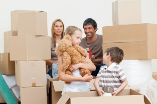 Household furniture and boxes being unloaded at a new Richmond property